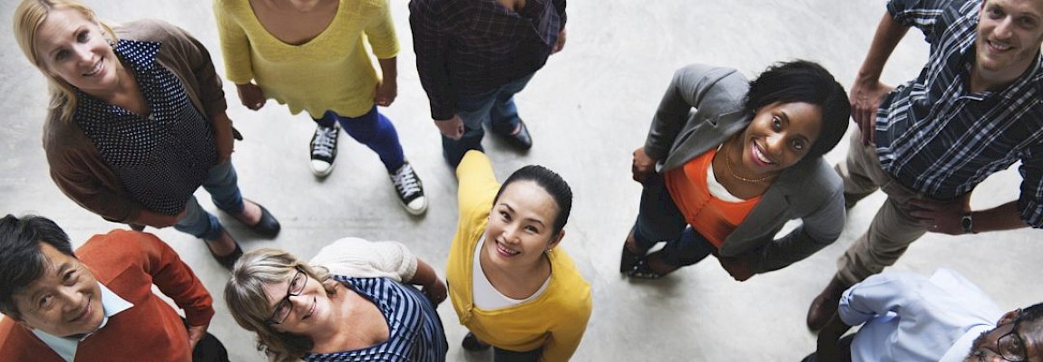 A group of people looking up at the camera.